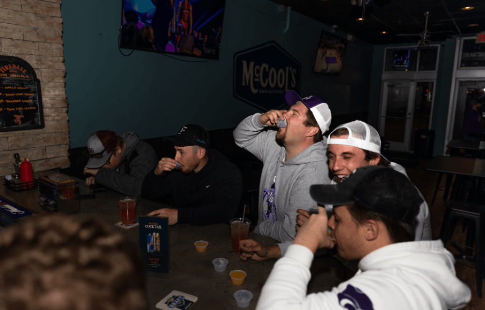 Group of Guys Taking Shots