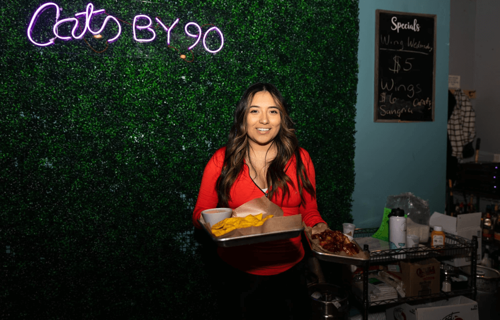 Waitress Holding wings