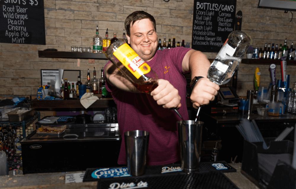 Bartender pouring drinks