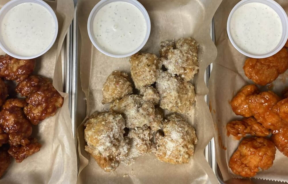 Three trays of wings